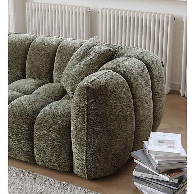 Winslow Pumpin Two Seater, Three Seater Sofa, Boucle with dining table centerpiece