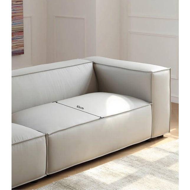 Ximenes Two Seater Sofa, Leathaire with round dining table wood