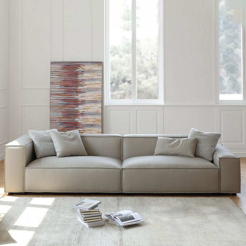 Detail view of Ximenes Two Seater Sofa, Leathaire with round dining room table