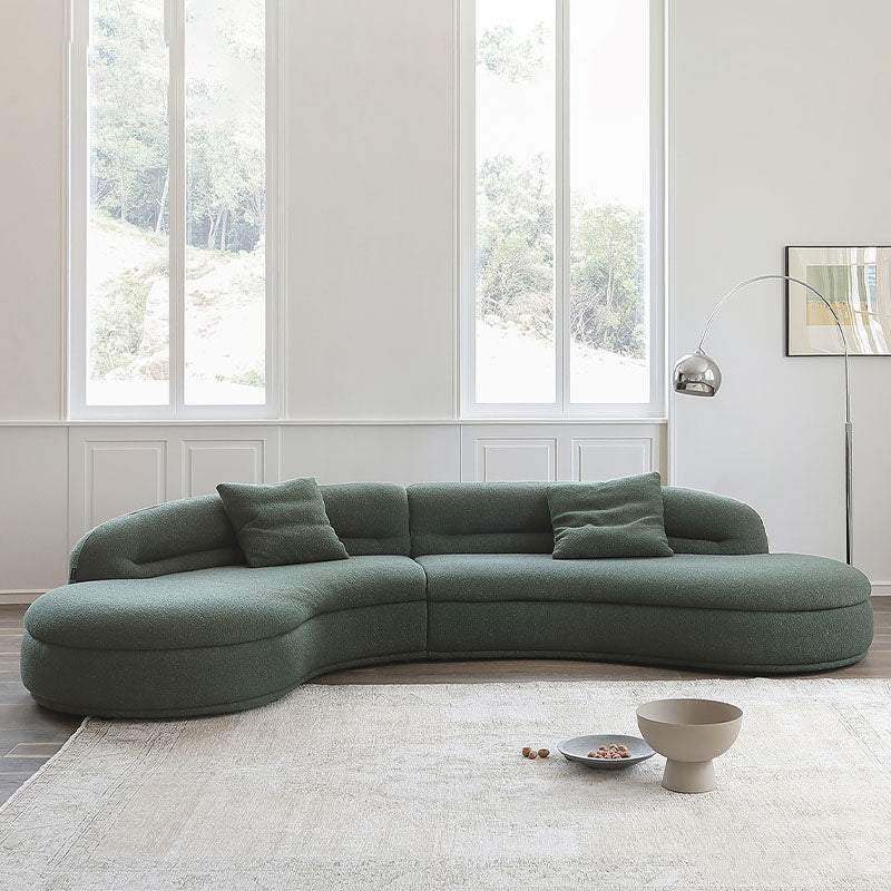 Yannik Four Seater Curved Sofa, Green in a lifestyle setting with grey curved sofa