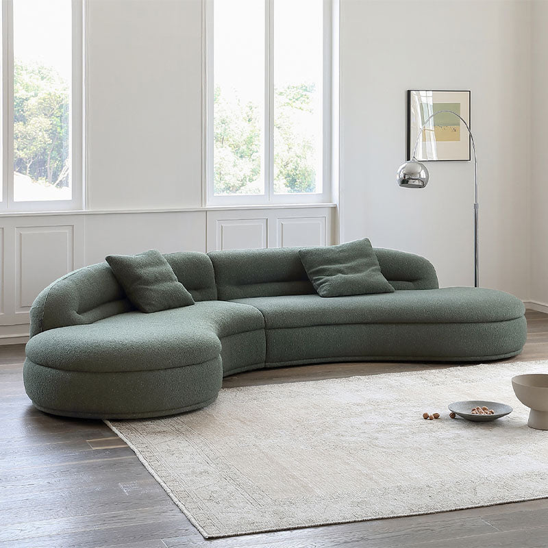 Detail view of Yannik Four Seater Curved Sofa, Green with curved sofas and sectionals