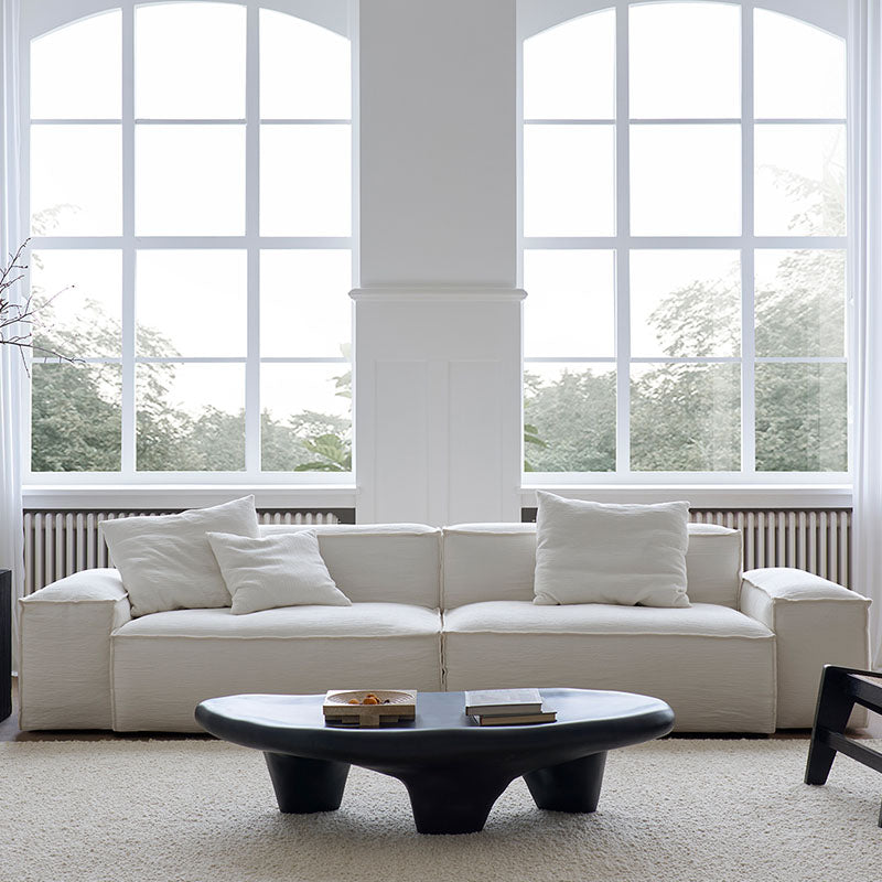 Zaavan Three Seater Sofa, Modular Sofa, White Linen in a lifestyle setting with extendable wooden dining table