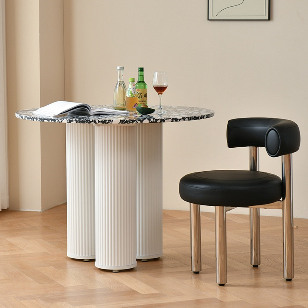 Detail view of Nelli Modern Round Dining Table, Marble with dining table for
