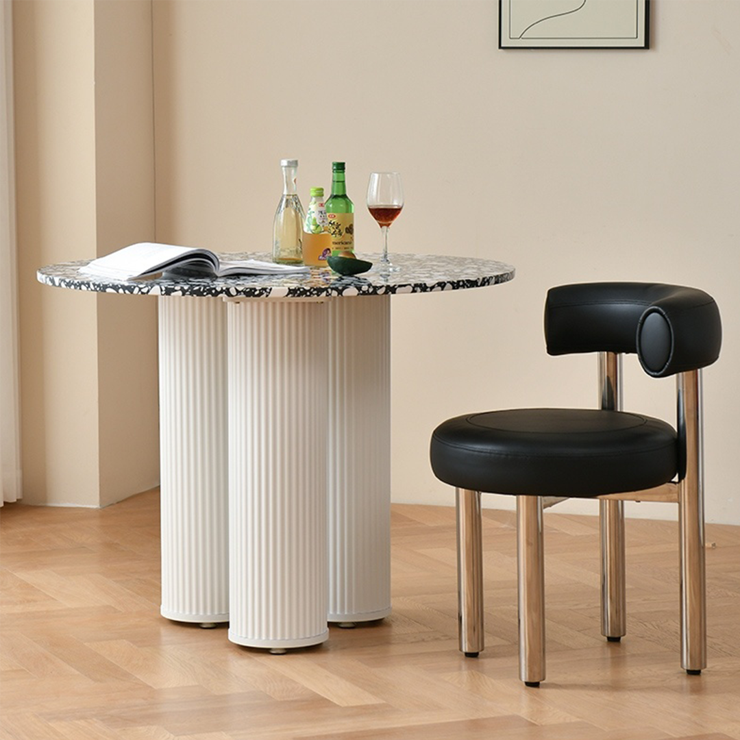 Detail view of Nelli Modern Round Dining Table, Marble with dining table for