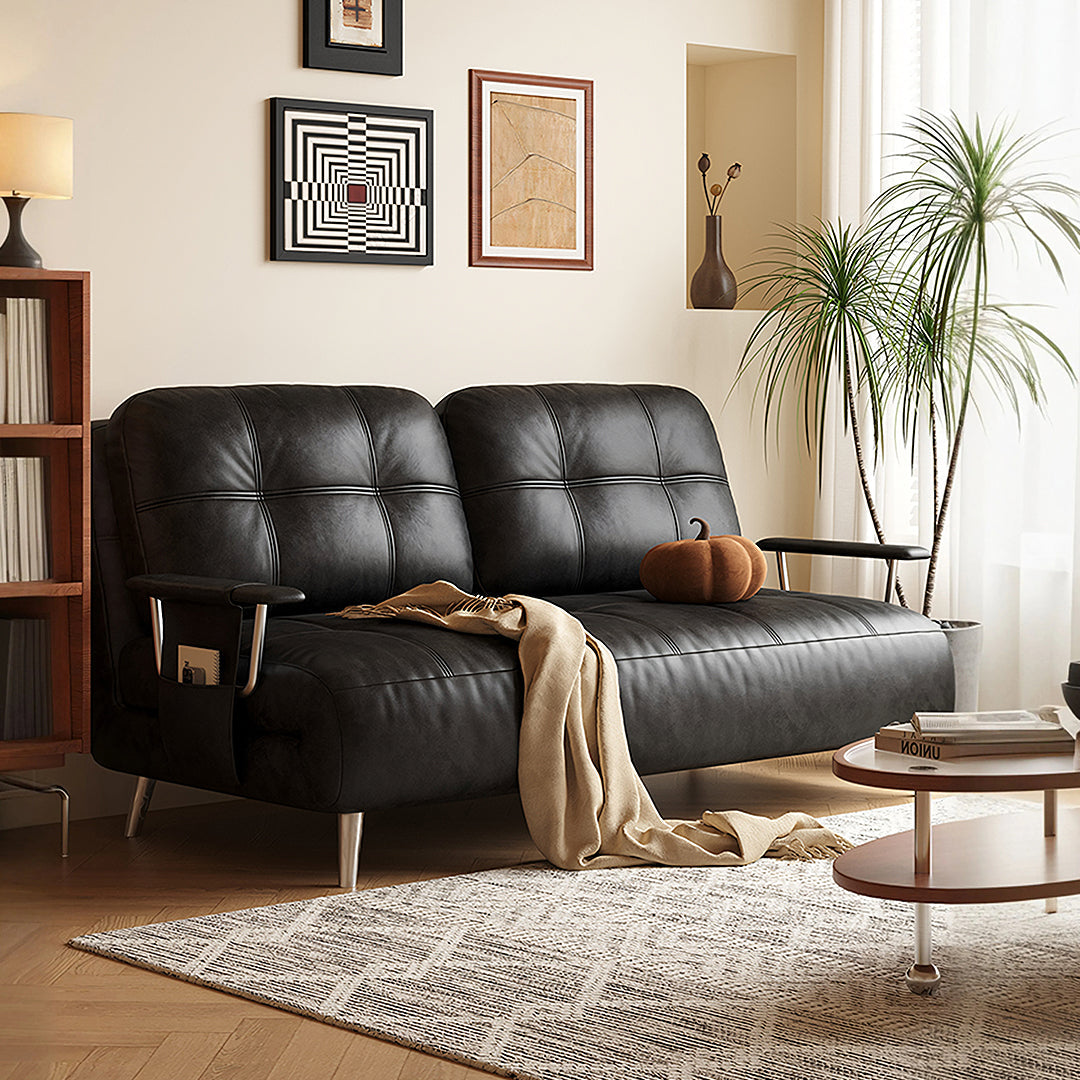 Riley Single Sofa Bed, Two Seater Sofa Bed, Black Leather in a lifestyle setting with ex display sofa bed clearance