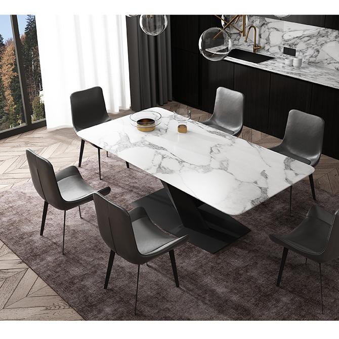 Sanders Dining Table, Sintered Stone in a lifestyle setting with black round dining table