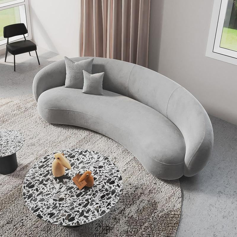 Romelia Three Seater Curved Sofa, Velvet, side view of curved leather sofa couch