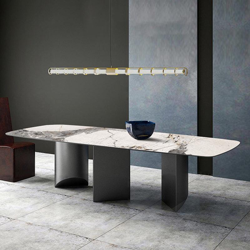 Detail view of Nala Dining Table With Black Legs, Sintered Stone with rug under dining table