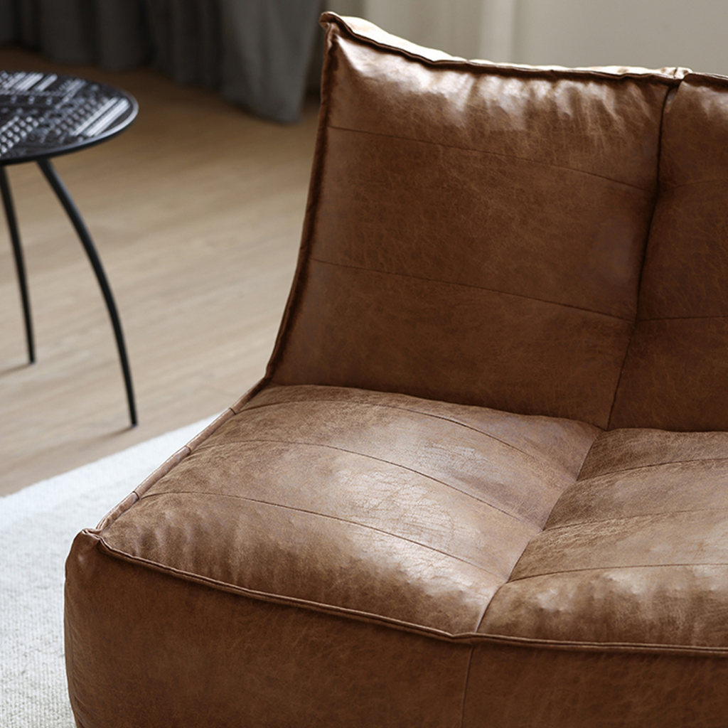 Detail view of Nalany Lazybag style Bean Bag, Leathaire with dining table and chairs oak