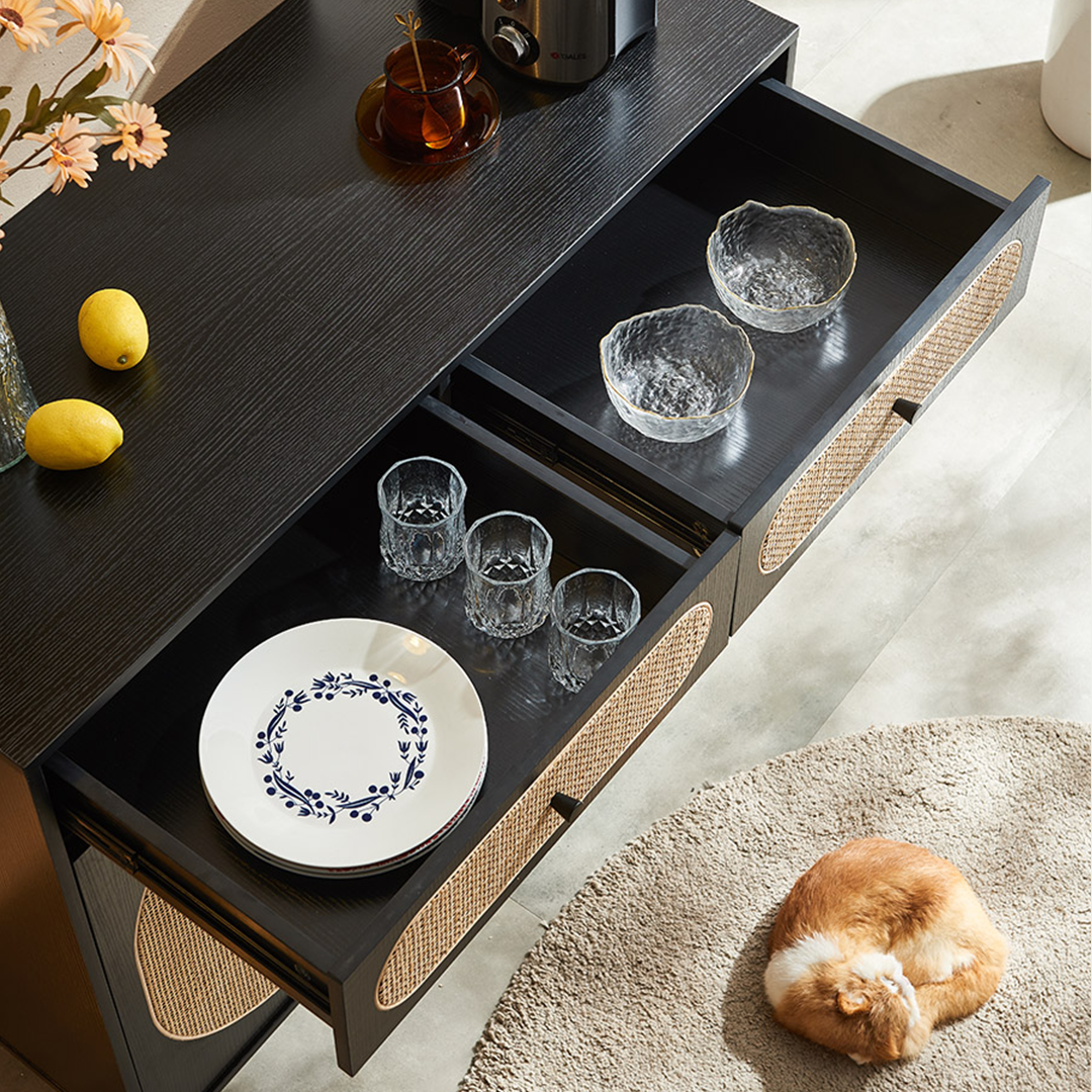 Barbary Rattan Sideboard, Black Or Oak in a lifestyle setting with sideboards and display cabinets