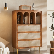Detail view of Maasai Tall Sideboard, Rattan & Solid Wood Cabinet with silver sideboard