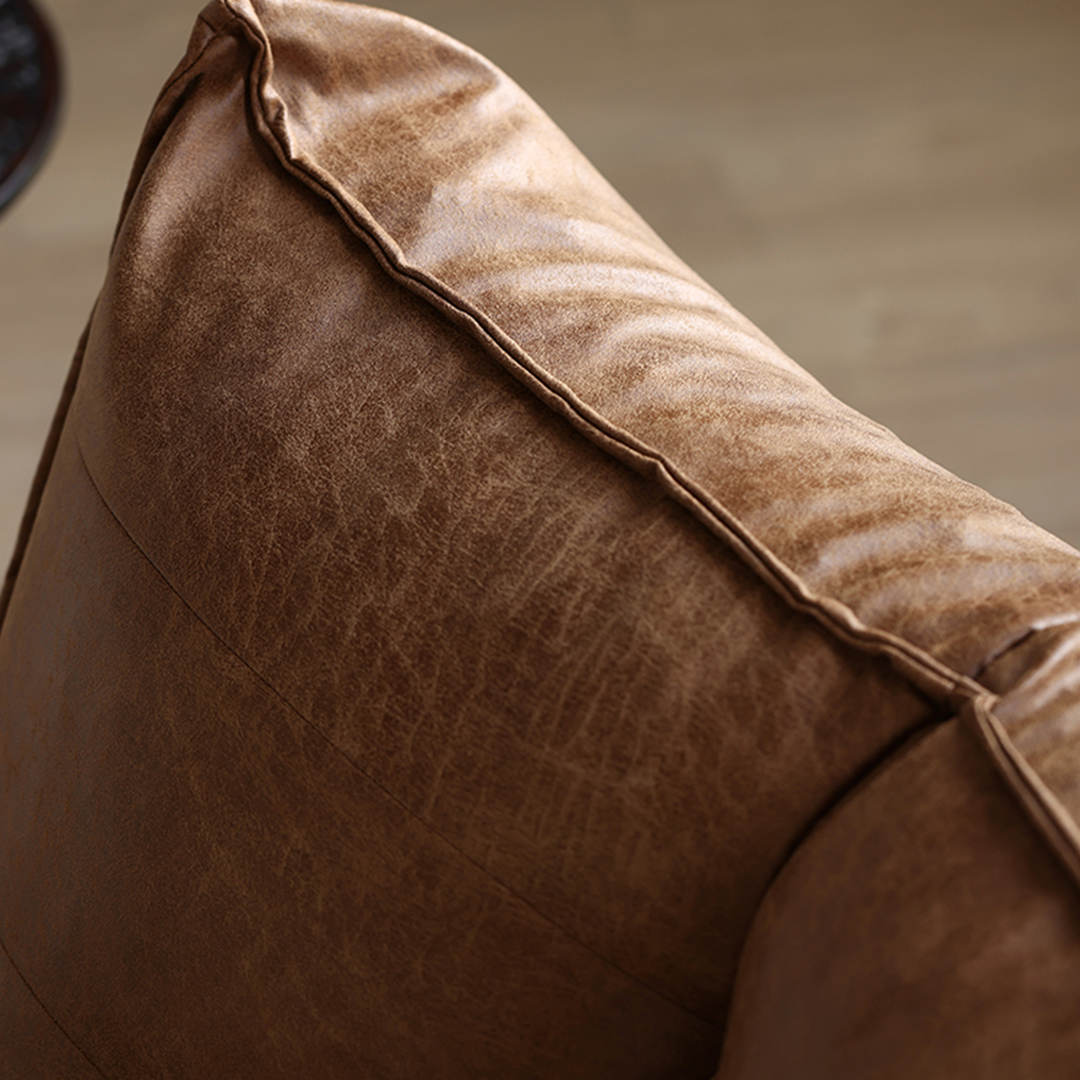Nalany Lazybag style Bean Bag, Leathaire in a lifestyle setting with dining table and chairs on