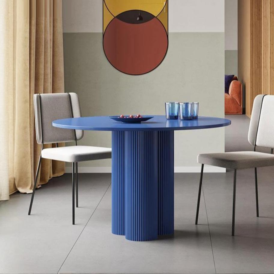 Detail view of Vogue Round Dining Table with extendable dining table and chairs