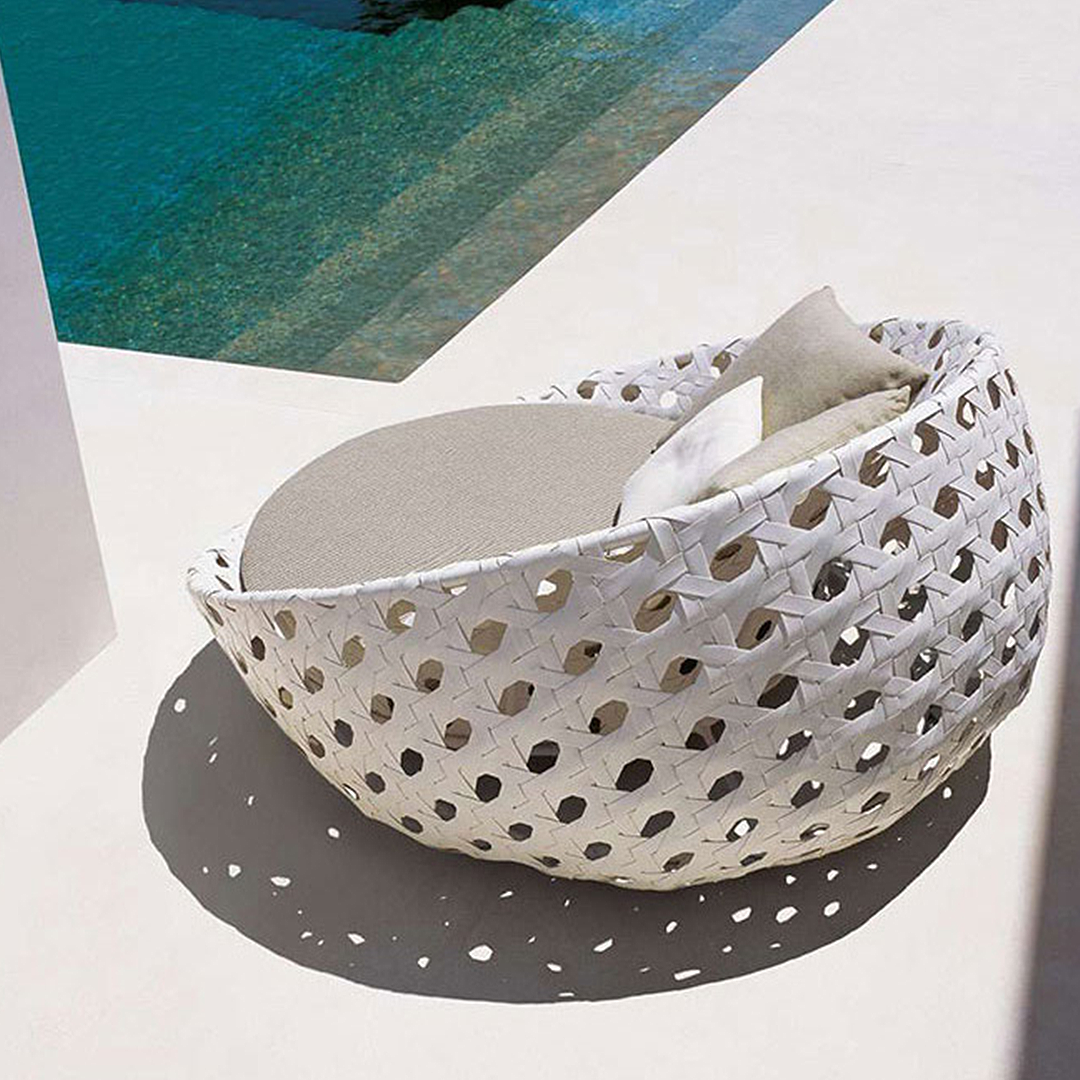 Detail view of Elysia Rattan Round Outdoor Daybed with sofa and pull out bed