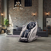 Massage chair in a modern living room with brick walls and decor.