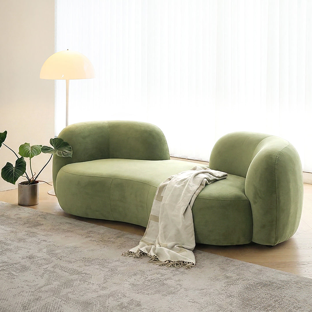 Elara Modern Curved Two Seater, Three Seater Sofa, Boucle, side view of curved velvet sofa