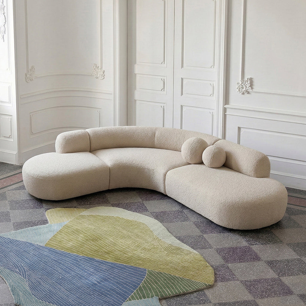 Eulalia Cream Curve Three Seater Sofa, Corner Sofa, Boucle, side view of chesterfield style corner sofa