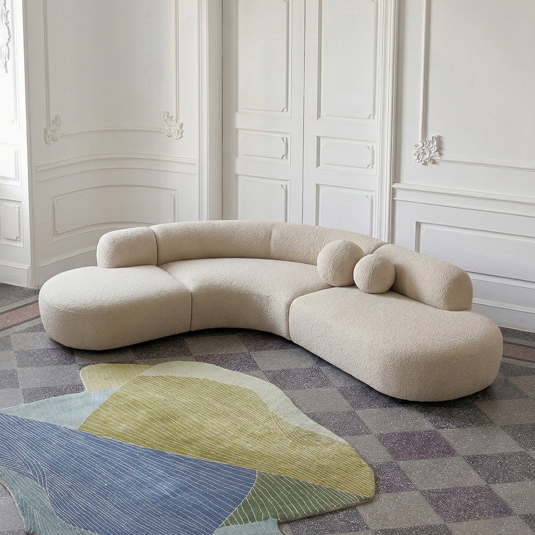 Eulalia Cream Curve Three Seater Sofa, Corner Sofa, Boucle, side view of chesterfield style corner sofa