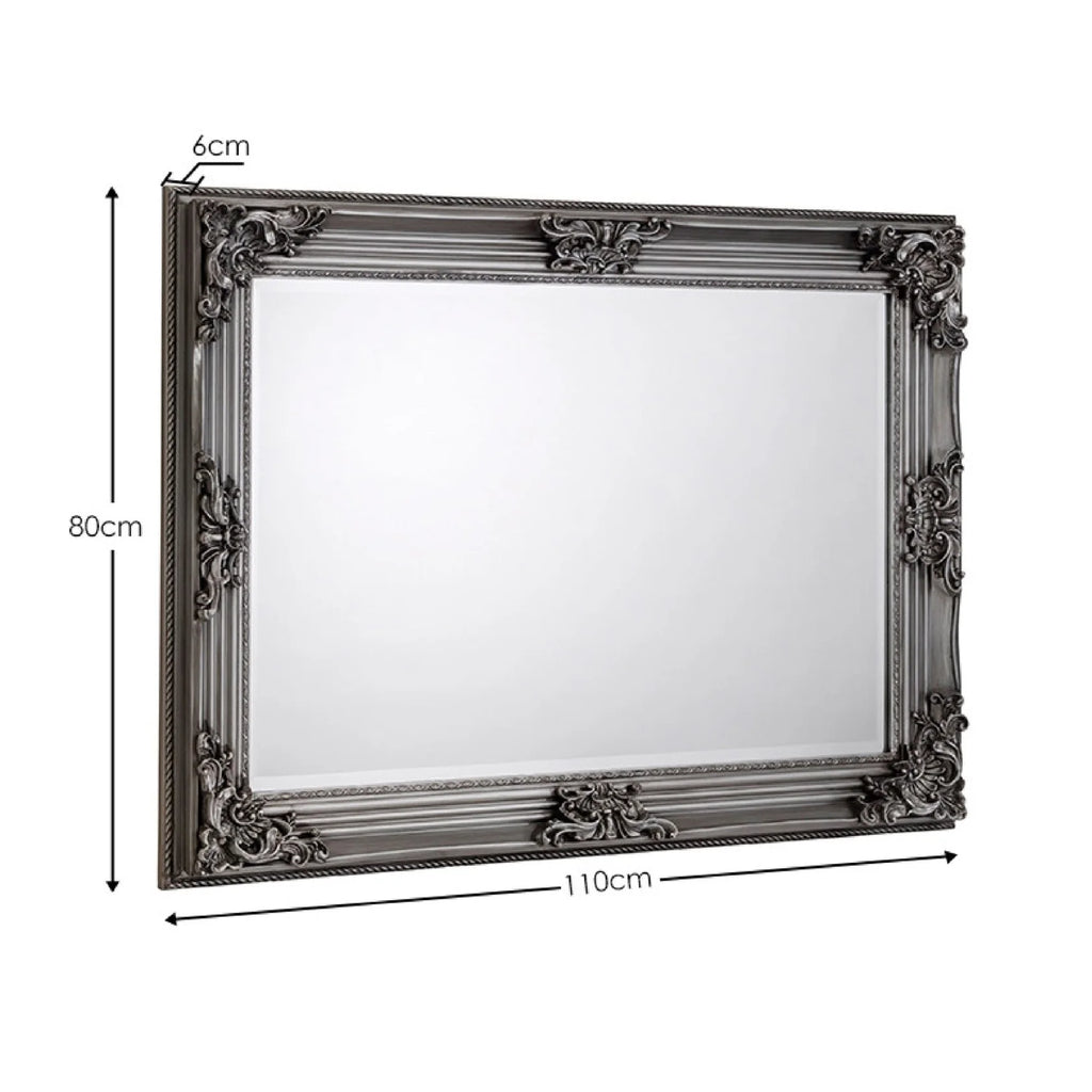 Decorative silver mirror with intricate designs iconic abode