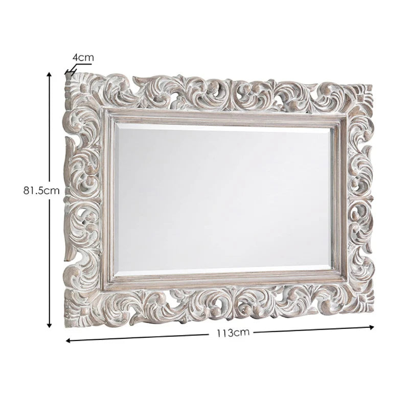 Decorative silver mirror with intricate patterns Iconic abode