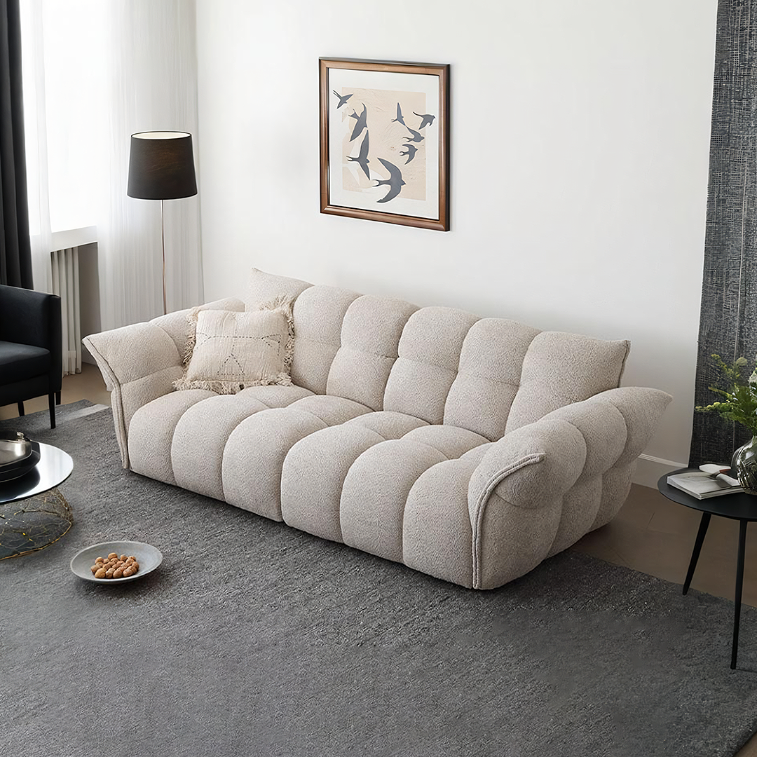 Tristin Two Seater, Three Seater Sofa, Boucle, side view of ceramic dining tables