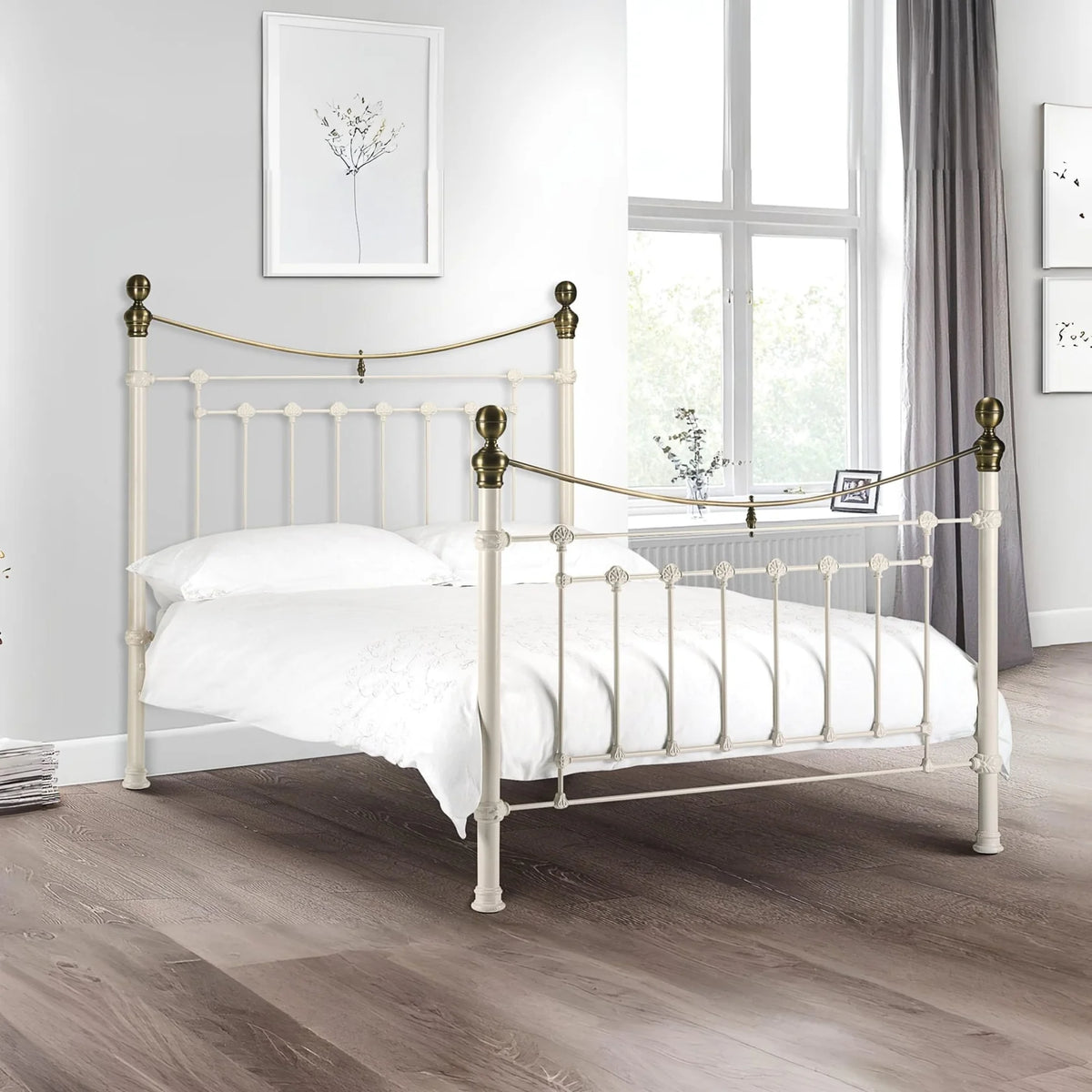 White metal bed with brass accents iconic abode