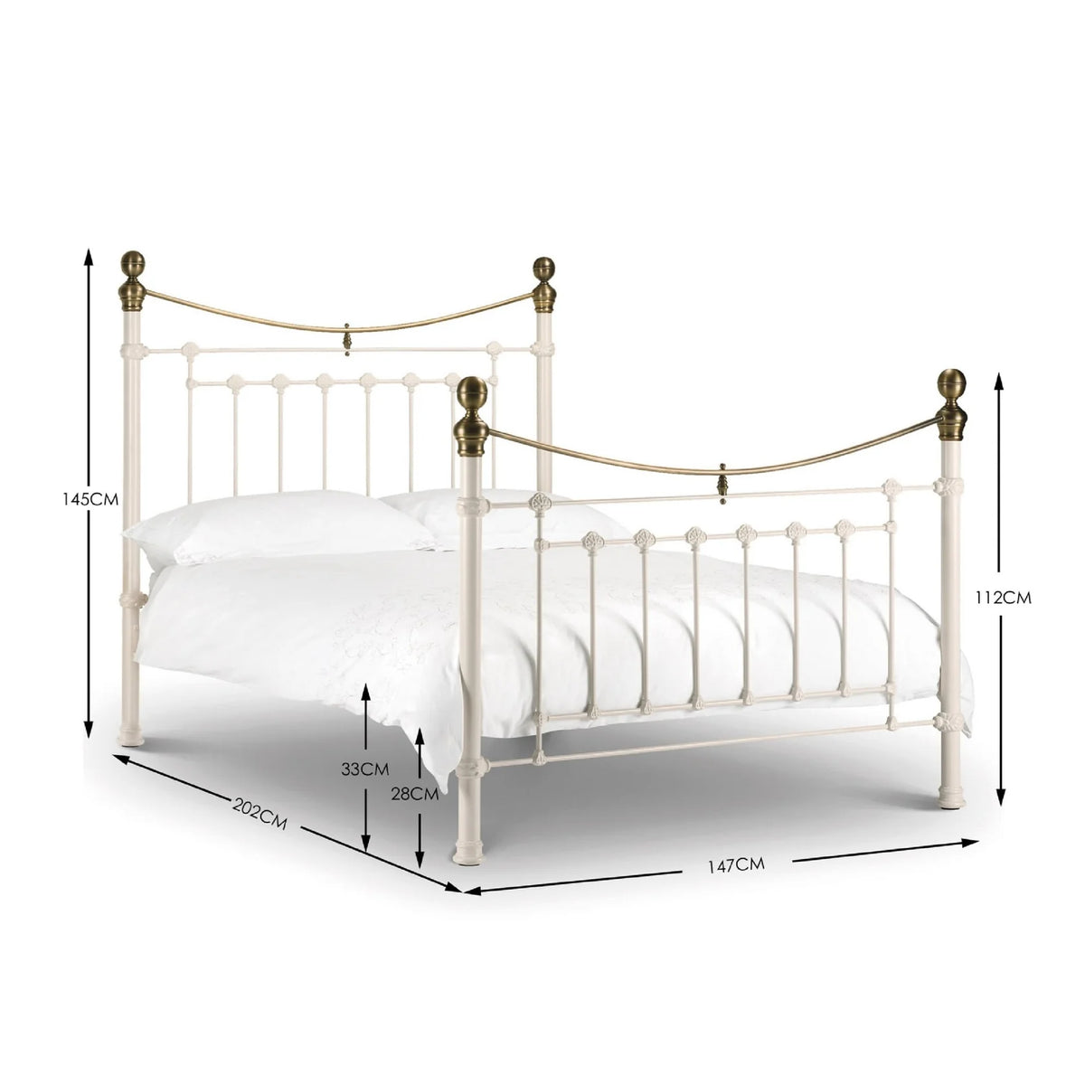 White metal bed with brass accents iconic abode