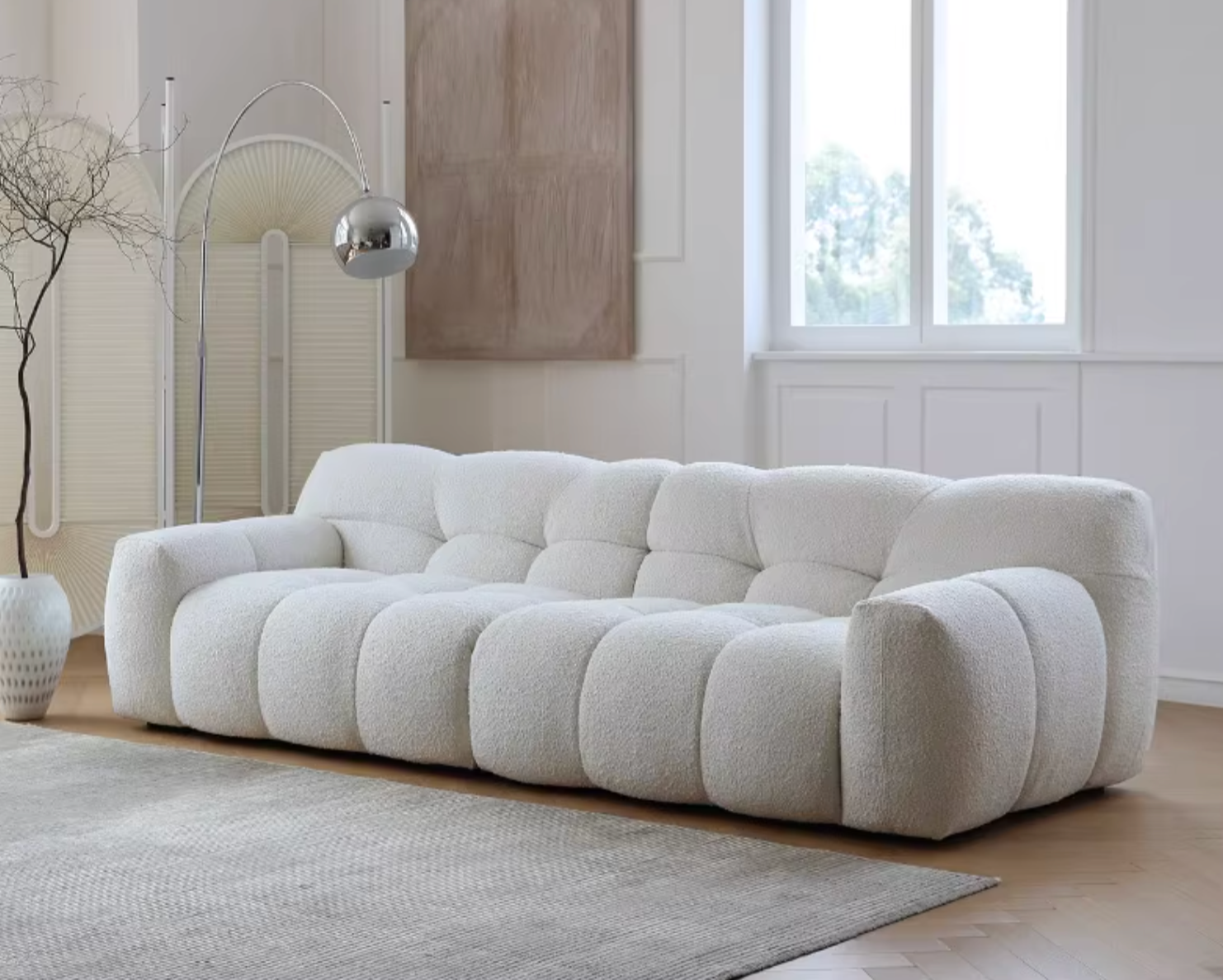 Cora Cloud Two / Three Seater Sofa, Boucle in a lifestyle setting with oval dining table and chairs