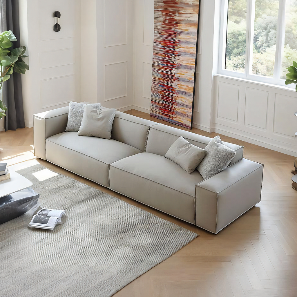 Ximenes Two Seater Sofa, Leathaire, side view of round black dining table