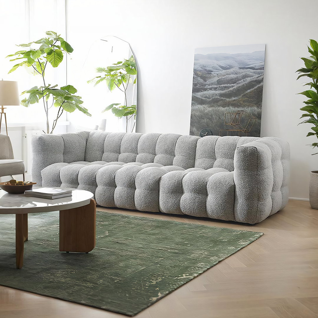 Zobah Two Seater, Three Seater Sofa, Grey Boucle, side view of dining table light