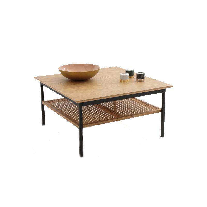 Acacia Cane Rattan Sideboard in a lifestyle setting with wood sideboards