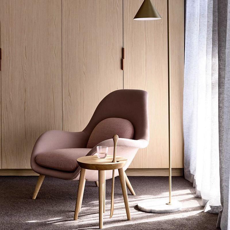 Fredericia Swoon Armchair And Footstool, Velvet with grey sideboard