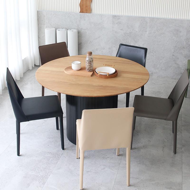 Barbican Round Dining Table in a lifestyle setting with round extending dining table