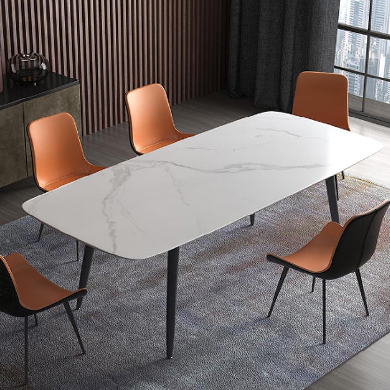 Detail view of Canopy Dining Table, Sintered Stone with dining table and bench