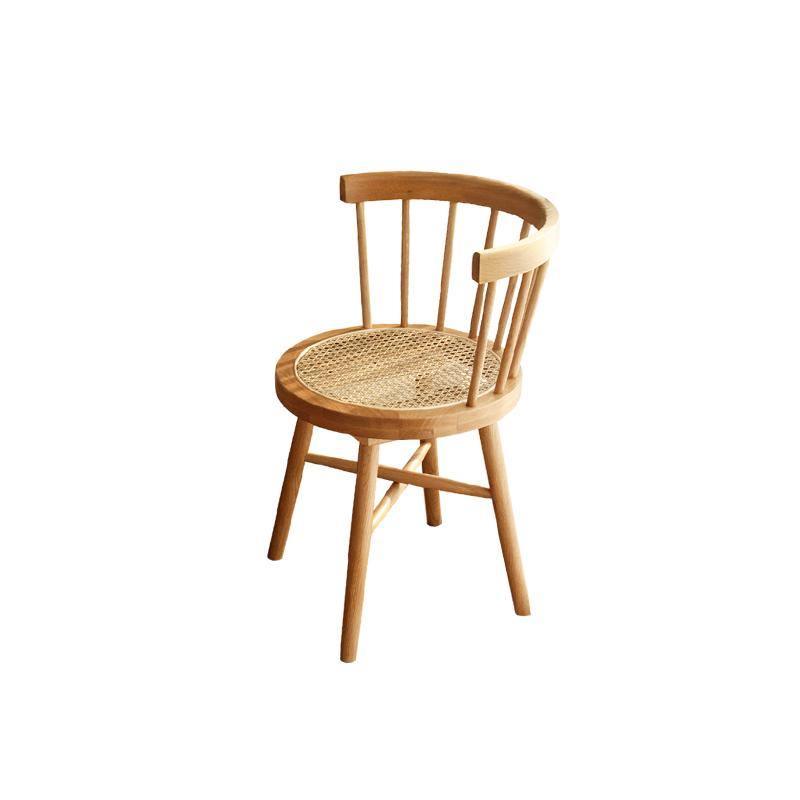 Bruce Rattan Dining Table, Light Oak, Round in a lifestyle setting with 8 seater dining table and chairs