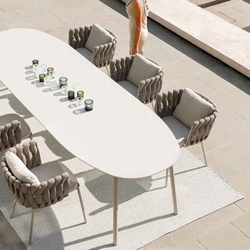 Vallee Rattan Outdoor Dining Table Set, Table With Six Dining Chairs, side view of 3 seat sofa bed